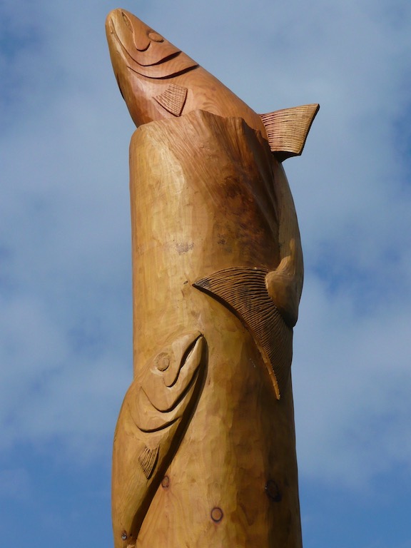 Hand carved wooden fish totem pole by Robin Wood