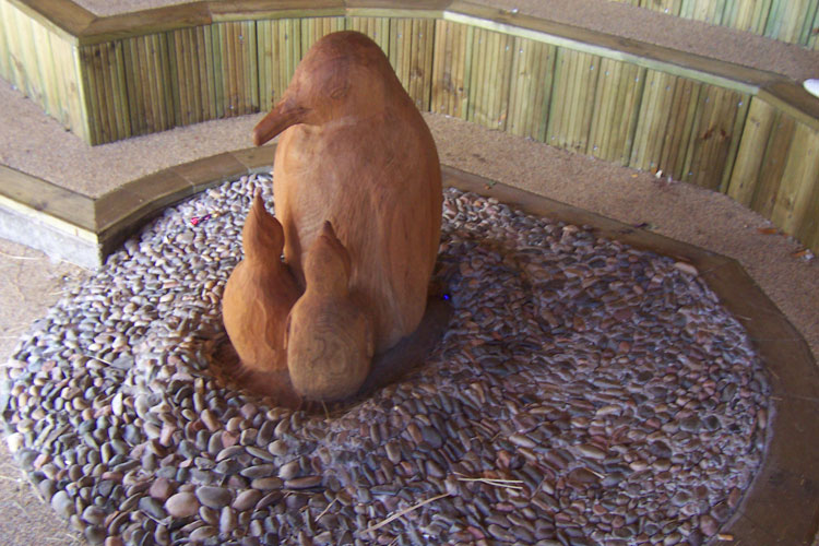 Penguins hand carved sculpture wildchild designs