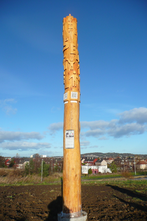 community hand carved totem pole sign wildchild designs