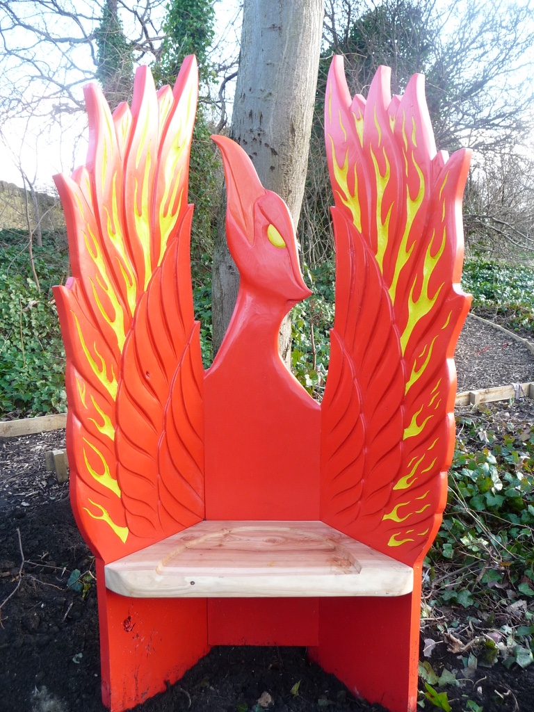 pheonix storytelling seat hand carved and painted