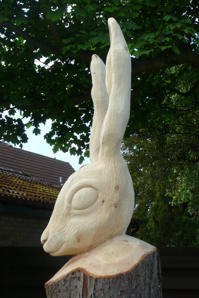 white rabbit hand carved wooden tree sculpture robin wood